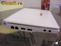 Asus eee PC 4G surf + 2 huse de protectie + cd / dvd writer extern + mouse optic logitech + card memorie de 16G foto