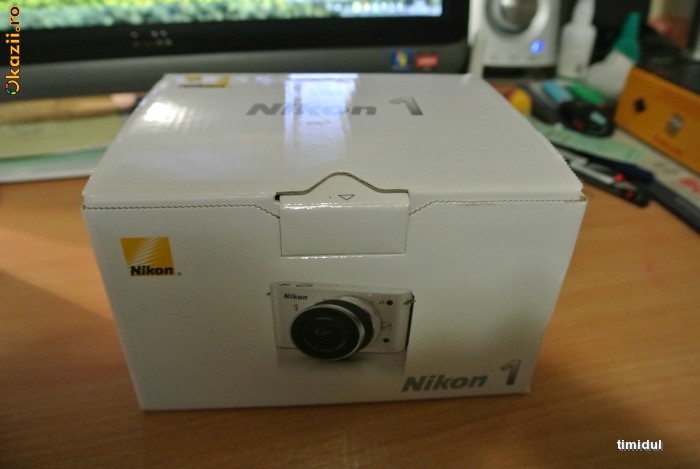 OFERTA  CEA MAI IEFTINA CAMERA - Nikon 1 J1, Body + Lentila 10-30 -Culoare ALBA  ~NOUA~ foto mare