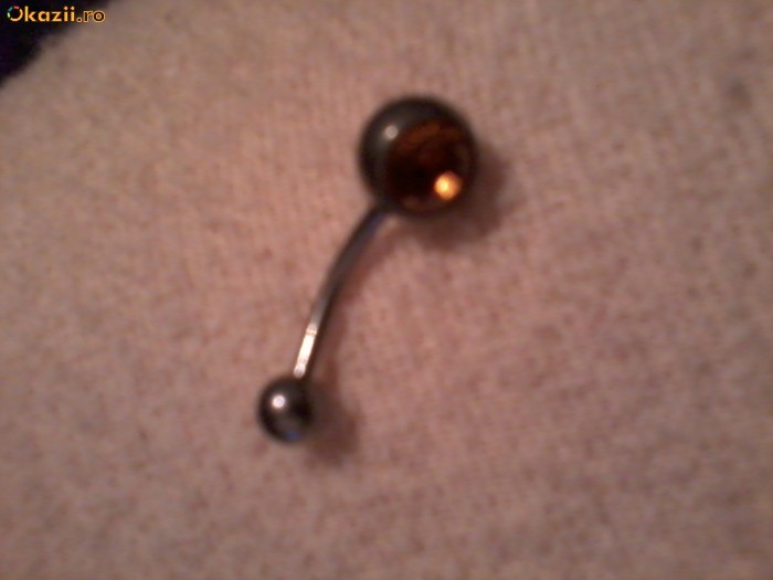 PIERCING BURIC foto mare