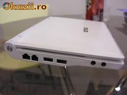 Asus eee PC 4G surf + 2 huse de protectie + cd / dvd writer extern + mouse optic logitech + card memorie de 16G foto mare